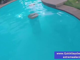 Guy sucks dick in the pool outside the hotel at the resort