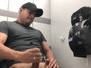 Latino sucking cock through a gloryhole