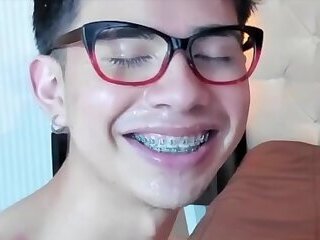 beautiful teen fag gets cum all over his braces and glasses