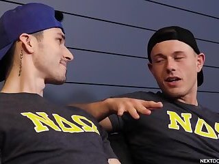 Nextdoorstudios - 2 muscular students having fun on the couch