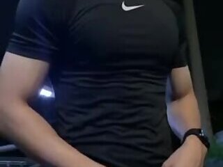 A shameless Asian hunk pleasuring himself in the late at night jerking on public park