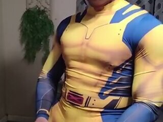 Hunky Wolverine jerks off solo