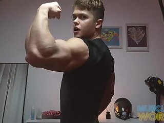 Oiled Up Muscle Boy Flexes And Cums