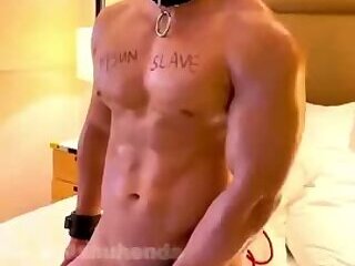 Showing Off His Muscle Slave
