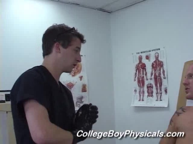 Tattooed Stud Sucking Cock In A Medical Room