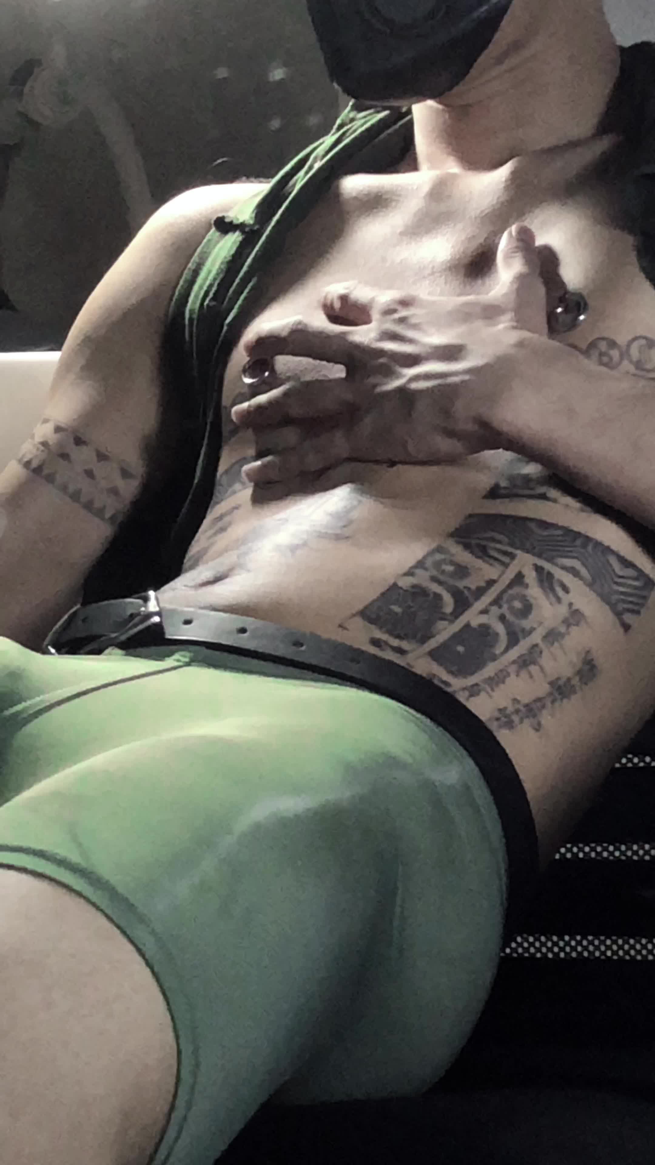 A soldier's hand covered in cum after jerking off, dripping onto his uniform