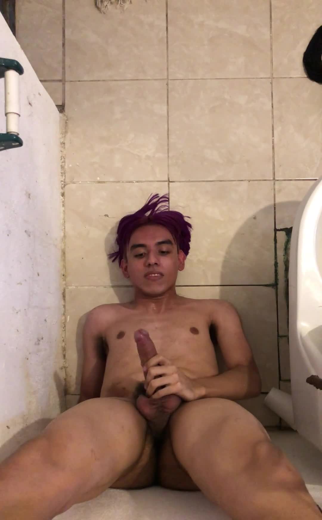 Purple-haired latino twink eating his own cum