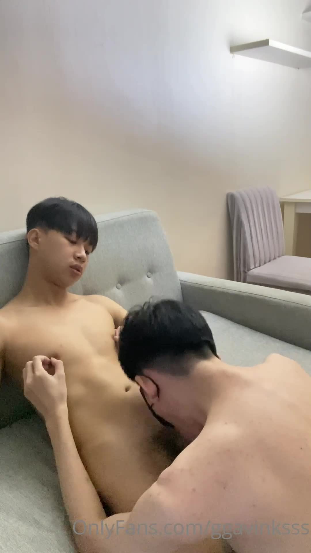 A man in a simple shirt looking relaxed before a photoshoot