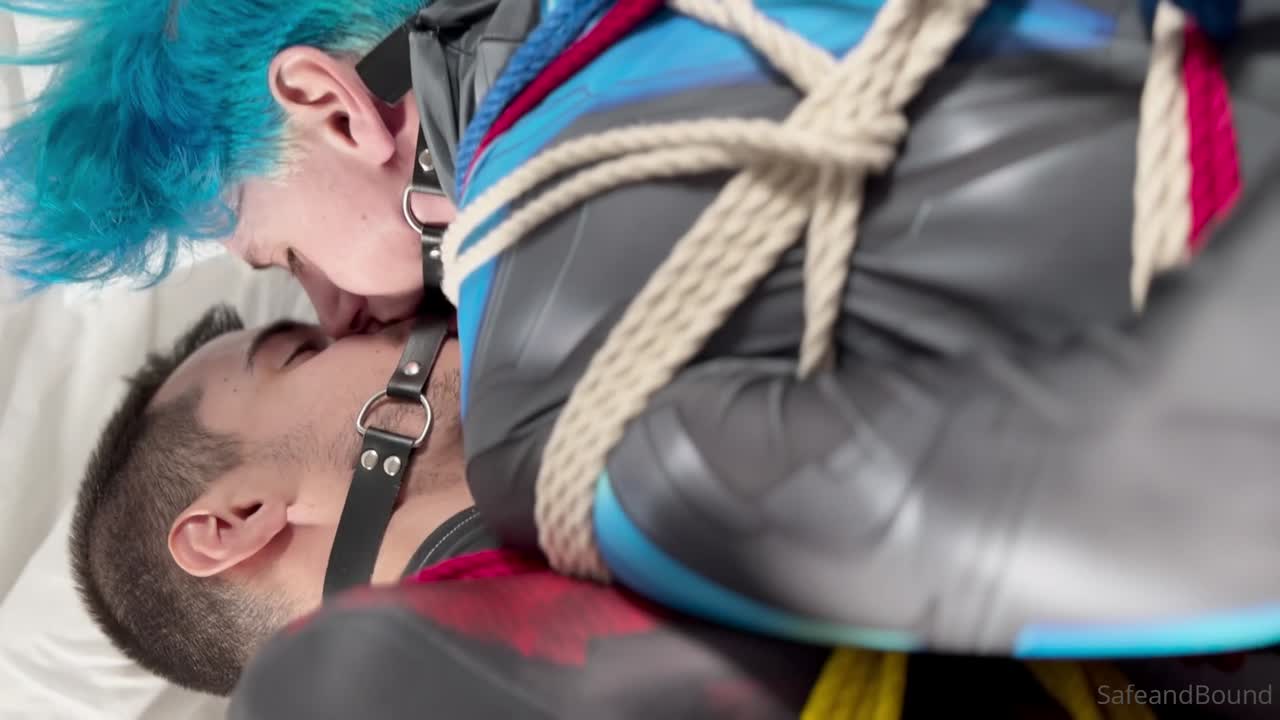 Nightwing and Robin in bondage and liplocker ball gag