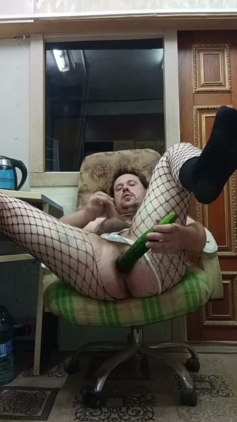 Gay loves to jerk off his cock with a huge cucumber in his ass!